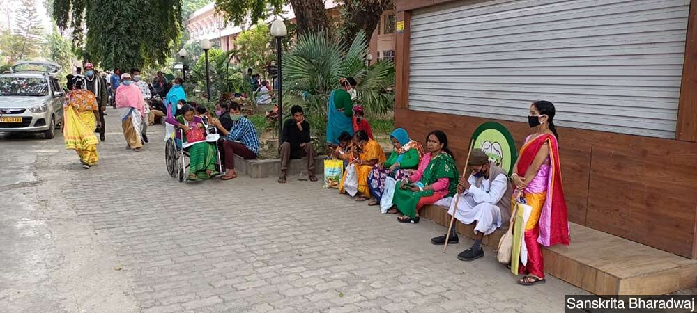 Patients and their families wait outside the Dr Bhubaneswar Borooah Cancer Institute in Guwahati, Assam, one of the oldest cancer care centres in the Northeast.